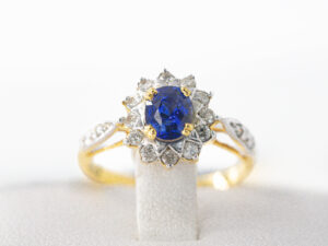 YGR 01 - 18 Kt White Gold Ring with a Blue Sapphire & Diamonds