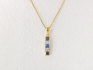 YGP 09 - 22 KT Gold Pendant with Blue Sapphires & Diamonds