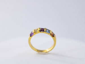 YGR 28 - 9 KT Gold Ring with Ceylon Stones